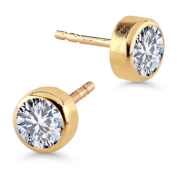 Kultakorvakorut zirkoneilla