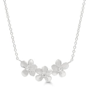 Rodinoitu hopeakaulakoru, kolme kukkaa zirkoneilla