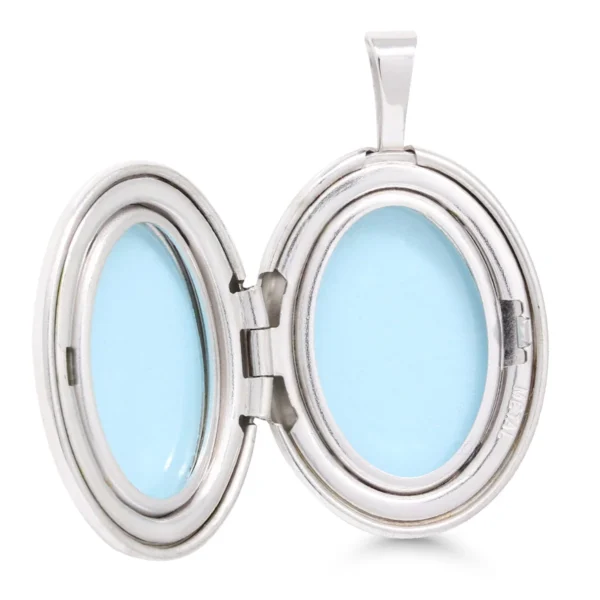 Hopeinen kukkakuvioitu medaljonki kahdelle kuvalle – ovaali