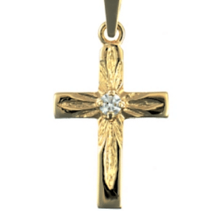 kultainen risti zirkonikivellä